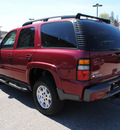 chevrolet tahoe 2005 red suv z71 gasoline 8 cylinders 4 wheel drive automatic 44024