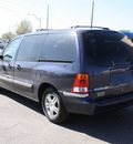 ford windstar 2002 blue van se gasoline 6 cylinders front wheel drive automatic with overdrive 80229