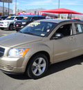 dodge caliber 2010 gold hatchback sxt gasoline 4 cylinders front wheel drive automatic 79925