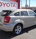 dodge caliber 2010 gold hatchback sxt gasoline 4 cylinders front wheel drive automatic 79925