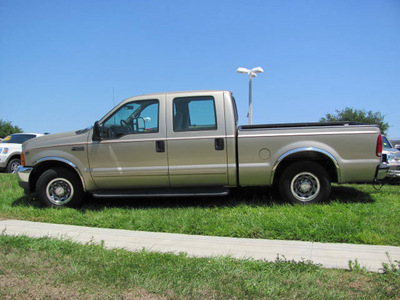ford f 250 2001 gold super duty gasoline 10 cylinders rear wheel drive automatic 33884