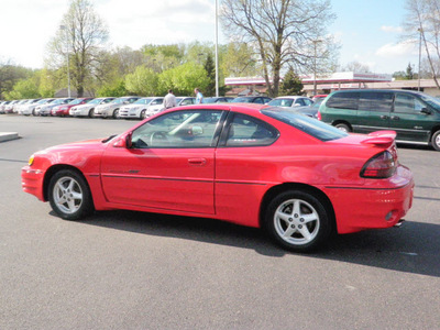 pontiac grand am 1999 red coupe gt gasoline v6 front wheel drive automatic 55124