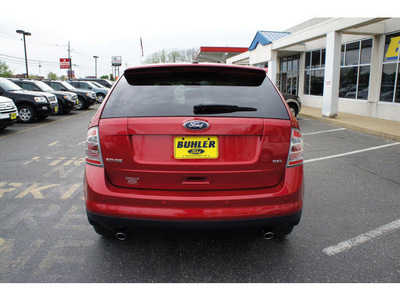 ford edge 2010 red candy suv sel gasoline 6 cylinders front wheel drive automatic with overdrive 07724