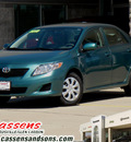 toyota corolla 2010 dk  green sedan le gasoline 4 cylinders front wheel drive automatic 62034