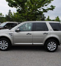 land rover lr2 2011 tan suv gasoline 6 cylinders all whee drive automatic 27511