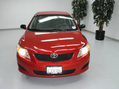 toyota corolla 2010 red sedan gasoline 4 cylinders front wheel drive automatic 91731