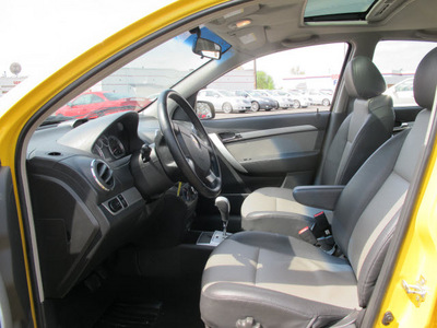 chevrolet aveo 2011 yellow sedan lt gasoline 4 cylinders front wheel drive automatic 45324