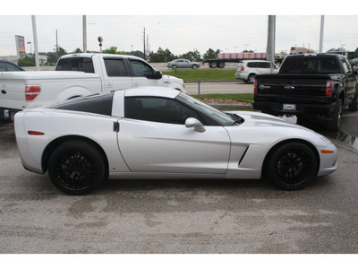 chevrolet corvette 2009 silver coupe gasoline 8 cylinders rear wheel drive 6 speed manual 77388