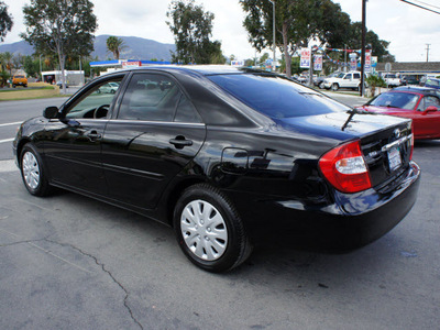 toyota camry 2003 black sedan le gasoline 4 cylinders front wheel drive automatic 92882