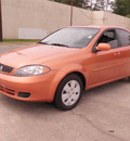 suzuki reno 2007 orange hatchback gasoline 4 cylinders front wheel drive automatic 28217