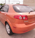 suzuki reno 2007 orange hatchback gasoline 4 cylinders front wheel drive automatic 28217