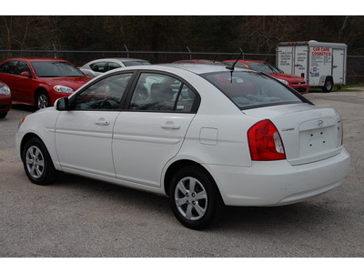 hyundai accent 2010 white sedan gls gasoline 4 cylinders front wheel drive automatic with overdrive 77037