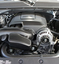 gmc yukon 2012 silver suv slt flex fuel 8 cylinders 4 wheel drive automatic 76087
