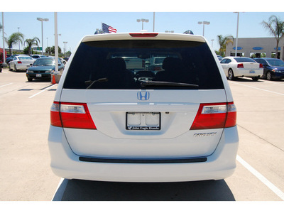 honda odyssey 2005 white van ex l w dvd w navi gasoline 6 cylinders front wheel drive automatic with overdrive 77065