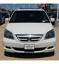 honda odyssey 2005 white van ex l w dvd w navi gasoline 6 cylinders front wheel drive automatic with overdrive 77065