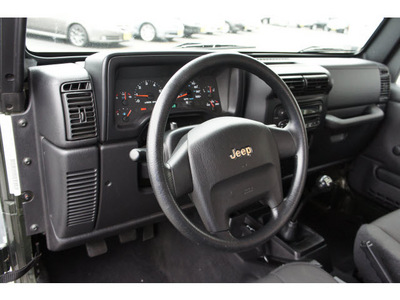 jeep wrangler 2006 jeep green suv se gasoline 4 cylinders 4 wheel drive 6 speed manual 07724
