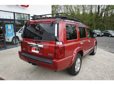 jeep commander 2006 inferno red suv limited nav dvd flex fuel 8 cylinders 4 wheel drive automatic 07724