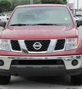 nissan frontier 2007 red se gasoline 6 cylinders rear wheel drive automatic 33884