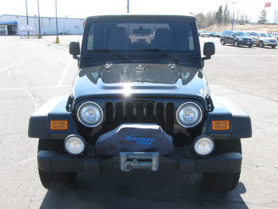 jeep wrangler 2005 black suv unlimited gasoline 6 cylinders 4 wheel drive 6 speed manual 55811