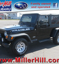 jeep wrangler 2005 black suv unlimited gasoline 6 cylinders 4 wheel drive 6 speed manual 55811