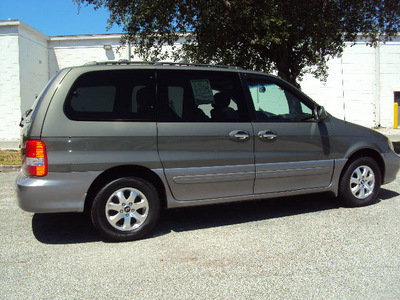 kia sedona 2004 gray van w sunroof w 3rd row seating gasoline 6 cylinders front wheel drive automatic 32901