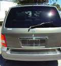 kia sedona 2004 gray van w sunroof w 3rd row seating gasoline 6 cylinders front wheel drive automatic 32901