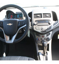 chevrolet sonic 2012 black sedan gasoline 4 cylinders front wheel drive 6 spd auto connivity plus 77090