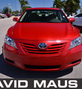 toyota camry 2009 red sedan le gasoline 4 cylinders front wheel drive automatic 32771