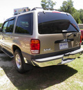 ford explorer 2001 tan suv xlt gasoline 8 cylinders rear wheel drive automatic 32447