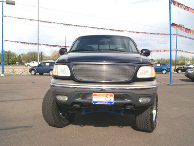 ford f 150 2001 deep wedgewood blue lariat gasoline 8 cylinders 4 wheel drive automatic 80911