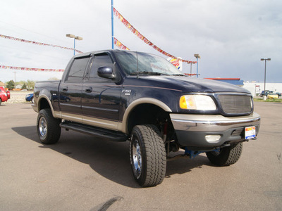 ford f 150 2001 deep wedgewood blue lariat gasoline 8 cylinders 4 wheel drive automatic 80911