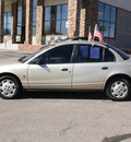 saturn s series 2002 gold sedan sl1 gasoline 4 cylinders front wheel drive automatic 80229