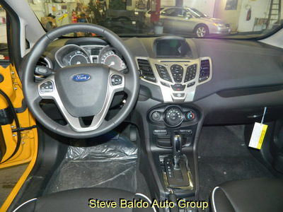 ford fiesta 2011 yellow hatchback gasoline 4 cylinders front wheel drive automatic 14304