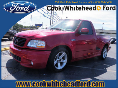 ford f 150 svt lightning 2003 red pickup truck gasoline 8 cylinders rear wheel drive automatic with overdrive 32401