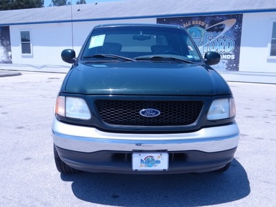 ford f 150 2002 dk  green pickup truck lariat gasoline 8 cylinders rear wheel drive automatic 77388