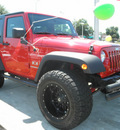 jeep wrangler 2009 red suv x gasoline 6 cylinders 4 wheel drive automatic 34474