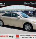 toyota camry 2010 gold sedan le gasoline 4 cylinders front wheel drive automatic 56001