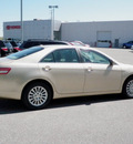 toyota camry 2010 gold sedan le gasoline 4 cylinders front wheel drive automatic 56001