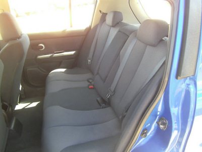 nissan versa 2009 blue hatchback 1 8 sl gasoline 4 cylinders front wheel drive automatic 75503