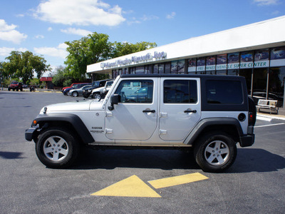 jeep wrangler unlimited 2012 silver suv sport gasoline 6 cylinders 4 wheel drive automatic 33021