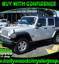 jeep wrangler unlimited 2012 silver suv sport gasoline 6 cylinders 4 wheel drive automatic 33021