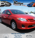 toyota corolla 2011 red sedan l gasoline 4 cylinders front wheel drive 5 speed manual 34788