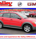 pontiac vibe 2005 red hatchback gasoline 4 cylinders front wheel drive automatic with overdrive 55124