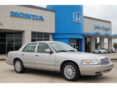 mercury grand marquis 2010 silver sedan ls flex fuel 8 cylinders rear wheel drive automatic with overdrive 77065