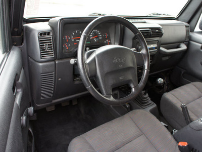 jeep wrangler 2003 black suv rubicon gasoline 6 cylinders 4 wheel drive 5 speed manual 98371