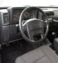 jeep wrangler 2003 black suv rubicon gasoline 6 cylinders 4 wheel drive 5 speed manual 98371