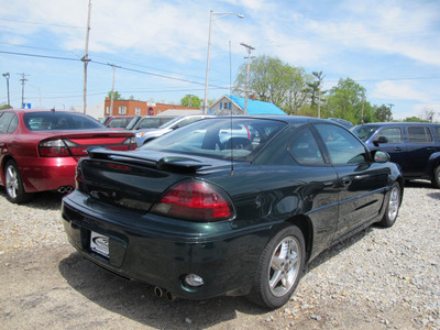 pontiac grand am 2002 green coupe gt gasoline 6 cylinders front wheel drive automatic 45324