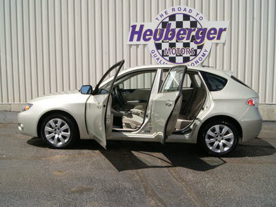 subaru impreza 2009 sunlight gold hatchback 2 5i gasoline 4 cylinders all whee drive automatic 80905