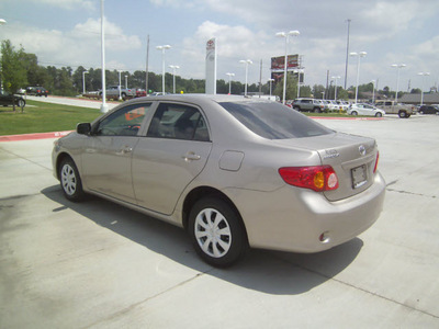 toyota corolla 2010 tan sedan le gasoline 4 cylinders front wheel drive automatic 75503