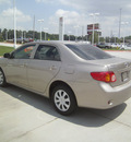 toyota corolla 2010 tan sedan le gasoline 4 cylinders front wheel drive automatic 75503